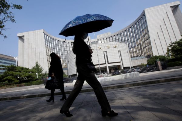 China’s central bank warns of financial risks, including defaults