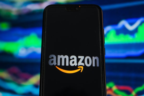 Stocks making the biggest moves midday: Amazon, P&G, Caterpillar, more