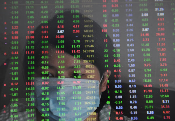 Chinese stocks briefly surge 30% as investors bet on Beijing exchange