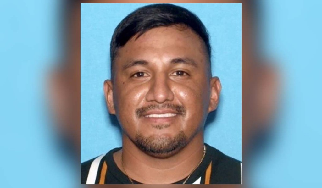 Carlitos Peralta, 33, is pictured in this photo released by Santa Ana police.