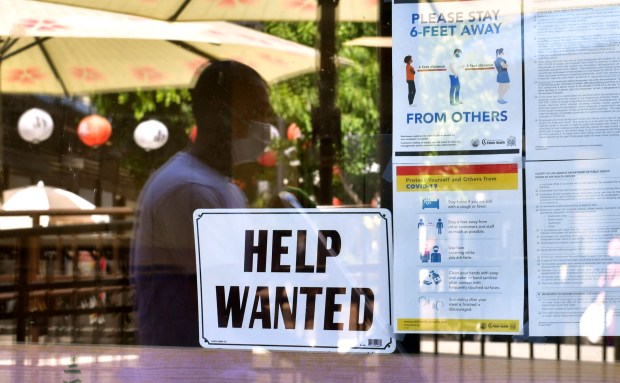 Owners of eateries in Southern California cut 300,000 jobs as pandemic business limitations made operations difficult or impossible. But loosening restrictions and the populace's urge to get out allowed eateries to replace all but 22,000 of those lost jobs. (Frederic J. Brown/AFP/Getty Images/TNS)