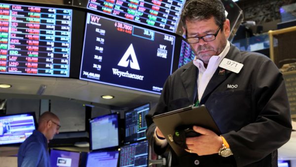 Stock futures fall after major averages dip, investors mull slowdown