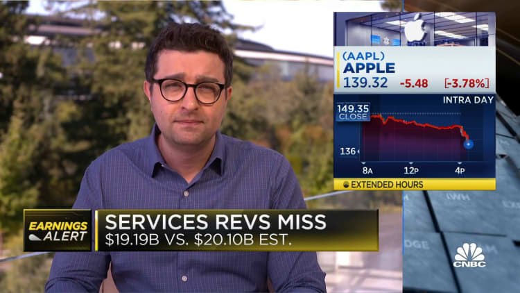 Apple beats on top and bottom lines, iPhone and services miss