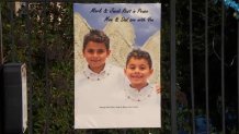 A poster of Mark and Jacob Iskander is displayed at a memorial for the boys on Sunday, Feb. 25, 2024.