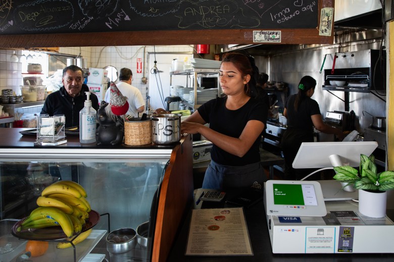 Waitress Daisy Marlene Montes Carranza works at El Rincon restaurant in the San Ysidro neighborhood of San Diego on April 16, 2024. The restaurant is one of several business that has been affected by recent closures at the U.S.-Mexico border. Photo by Adriana Heldiz, CalMatters